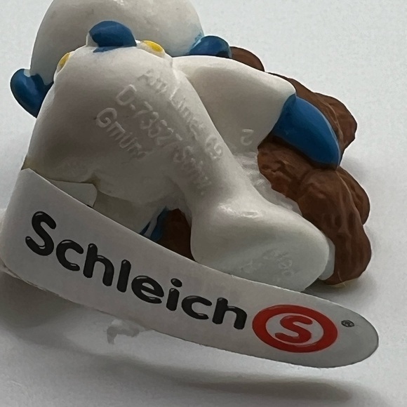 Schleich Baby Smurf With Bear NEW With tags  Approx 1 Inch - Picture 2 of 2